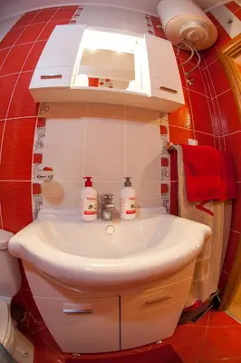 a bathroom with a sink and a toilet at Piano apartments in Kotor