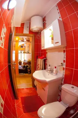a bathroom with a toilet and a sink at Piano apartments in Kotor
