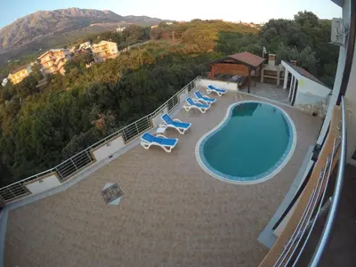 an aerial view of a swimming pool on a house at Belvedere Apartments with Seaview in Dobra Voda