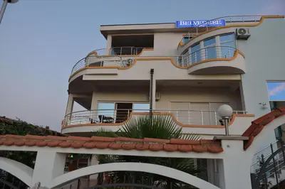 a building with balconies on the side of it at Belvedere Apartments with Seaview in Dobra Voda