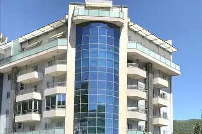 a tall building with a lot of windows at Apartman Tijana in Budva