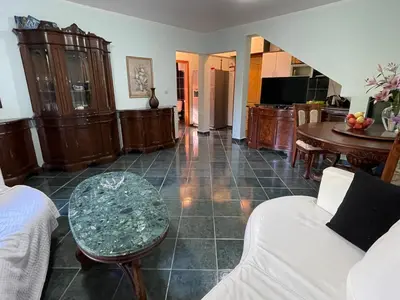 a living room with a couch and a table at 4M Apartments in Petrovac na Moru