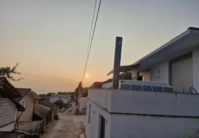 a view of the sunset from a house at Apartmani Kruče in Ulcinj