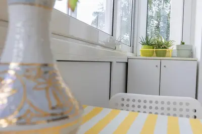 a vase sitting on a table in a kitchen at Apartment Mia in Podgorica