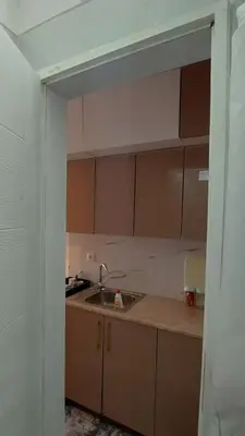 a kitchen with a sink and a counter top at Apartment Pinješ in Ulcinj