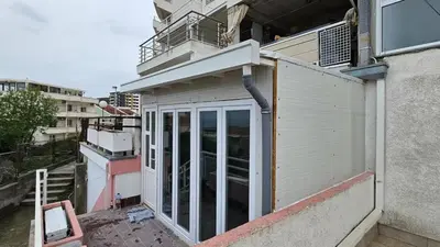 an open door on the side of a building at Apartment Pinješ in Ulcinj