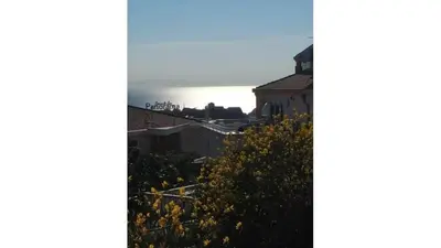 a view of the city from the roof of a building at Apartment Pinješ in Ulcinj