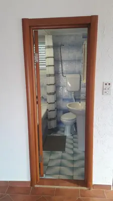 a bathroom with a toilet and a sink at Teona-Apartments in Sutomore
