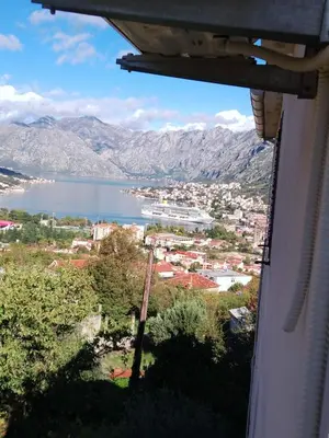 a view of a city and a body of water at Apartman Blazo in Škaljari