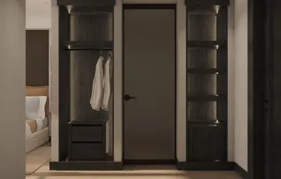 a room with a door and a closet with shelves at Hotel Madeira in Budva