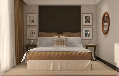 a bedroom with a large bed and a mirror at Hotel Madeira in Budva