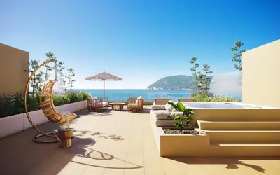 a patio with a view of the ocean at Iberostar Selection Montenegro in Bar