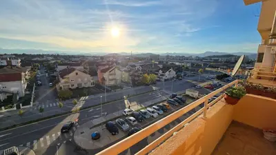 a view of a city with cars parked on a street at Rajka Lux in Podgorica