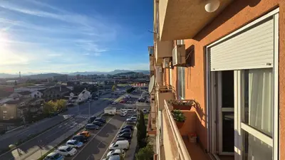 a view of a city street from a balcony at Rajka Lux in Podgorica