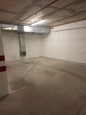 an empty parking lot in a parking garage at Ljubovic prestige apartment in Podgorica