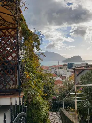 a view of a city from a balcony at Apartmani Vila Marija in Budva