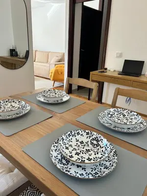 a table with four plates on top of it at Stay In Bar in Bar
