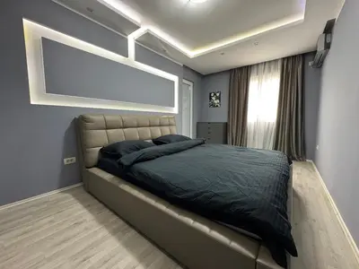 a bedroom with a large bed with a large window at Lucky Space 3 Apartment in Budva