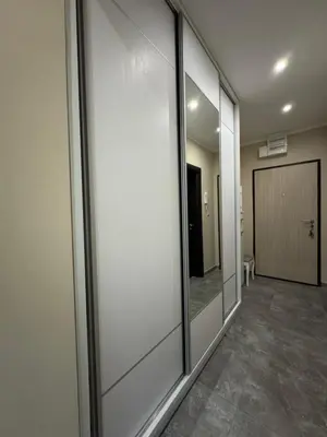 a hallway with sliding glass doors in a building at Lucky Space 3 Apartment in Budva
