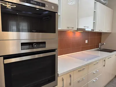 a kitchen with a stove and a sink at Lucky Space 3 Apartment in Budva
