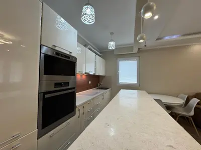 a kitchen with a counter and a stove top oven at Lucky Space 3 Apartment in Budva