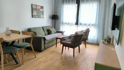 a living room with a couch and chairs and a table at Apartments LORA Novi Bar in Bar