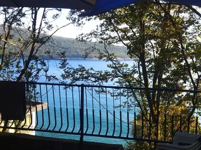 a view of a lake from a balcony at Beach House Kruče in Ulcinj