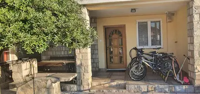 a group of bikes parked in front of a house at Anika in Podgorica
