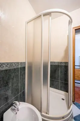 a bathroom with a shower and a sink at Tara Rooms In The Heart Of Old Town Kotor in Kotor