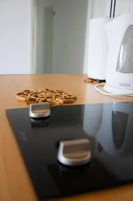 a close up of a counter with a coffee maker at Luce di Sole Apartment in Ulcinj