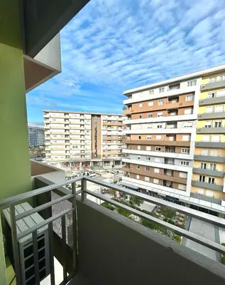a balcony with a view of a building at Elegant apt in Central Point in Podgorica