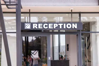 a sign on the door of a store at Hotel Lajka Luxury in Ulcinj