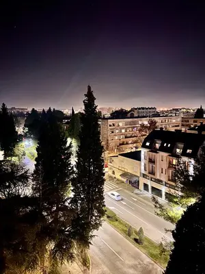 a view of a city street with trees and buildings at Gorica Hill Luxury Residence in Podgorica