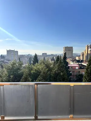 a view of a city skyline from a balcony at Gorica Hill Luxury Residence in Podgorica