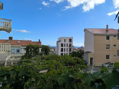 a view of a city with buildings and trees at Nar in Budva
