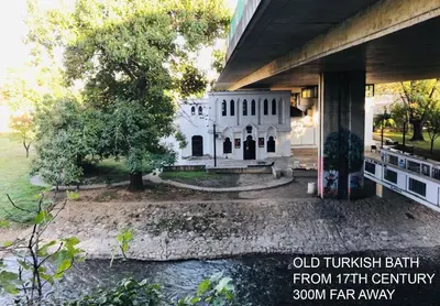 an old turkish bath house under a bridge at Parkside Place in Podgorica