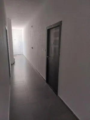 an empty hallway with a door in a room at Luxury Andrej Apartment with Garage in Polje
