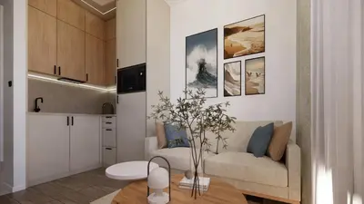 a living room with a couch and a table at Ramonda Villa&Pool in Buljarica