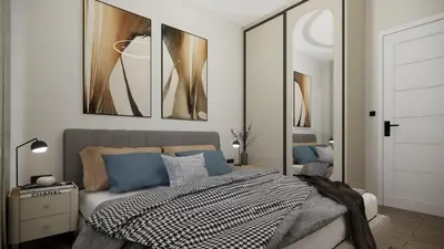 a bedroom with a bed with two pictures on the wall at Ramonda Villa&Pool in Buljarica