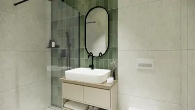 a bathroom with a sink and a mirror at Ramonda Villa&Pool in Buljarica