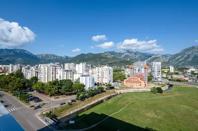 a view of a city with buildings and a park at Sunny View in Bar