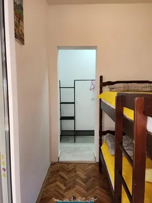 a room with two bunk beds and a doorway at Inga - Apartment Ulcinj sea view in Ulcinj