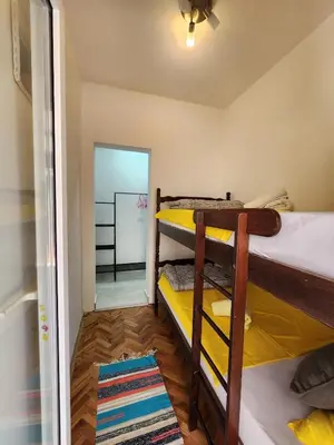a room with two bunk beds and a bathroom at Inga - Apartment Ulcinj sea view in Ulcinj