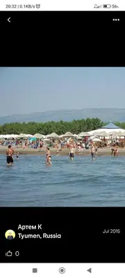 a group of people in the water at a beach at Grandino holidays rooms&appart in Ulcinj