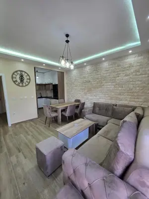 a living room with a couch and a table at S&M Stan in Ulcinj