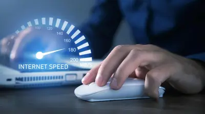 a hand on a computer mouse next to a speedometer at CL Home Lux in Podgorica