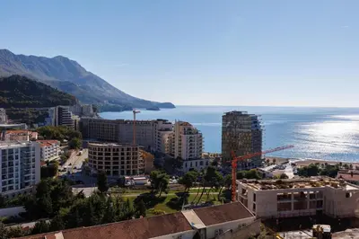 an aerial view of a city with the ocean at Panoramic Sea View 1BD Apartment in Becici