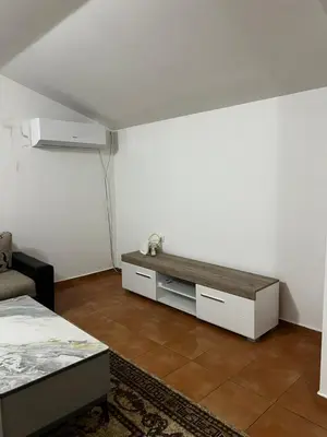 a room with a table in the corner of a room at Kuca in Lajkovići