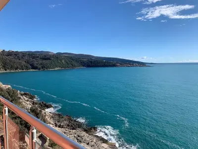 a view of the ocean from a bridge at Apartament Nadia DUBRAVA BAR in Dobra Voda