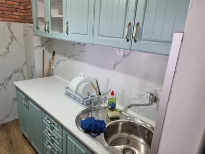 a kitchen with a sink and a counter top at Buddub in Budva